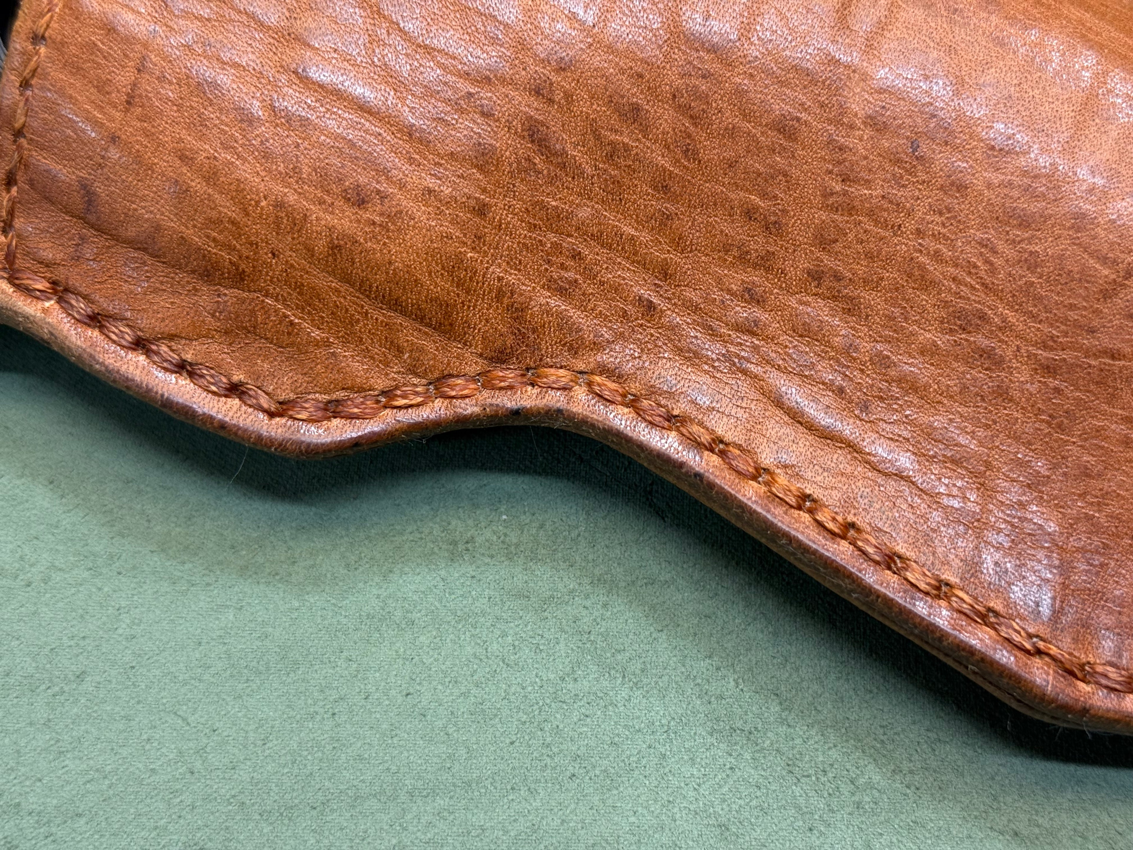 Tough leather pistol holster