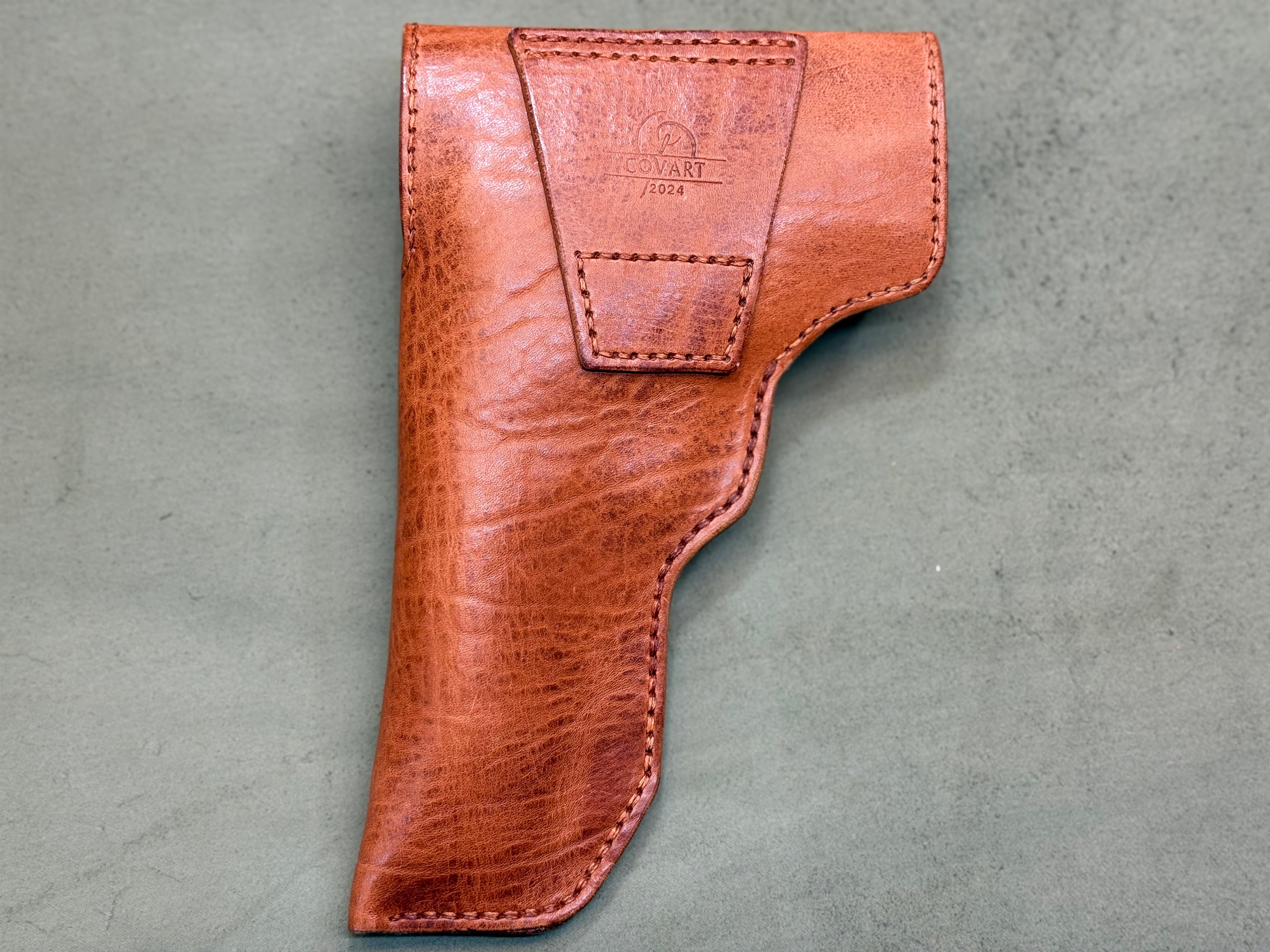 Tough leather pistol holster